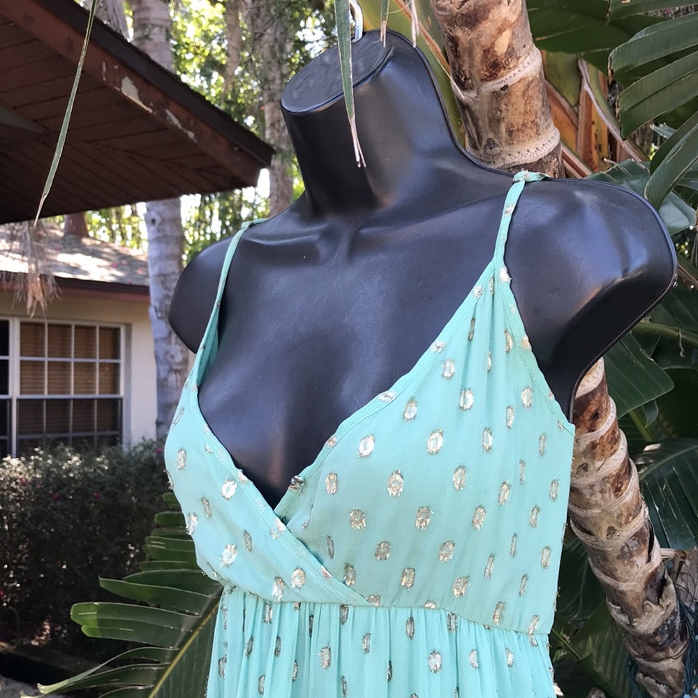 En crème Polkadot chiffon tiered dress